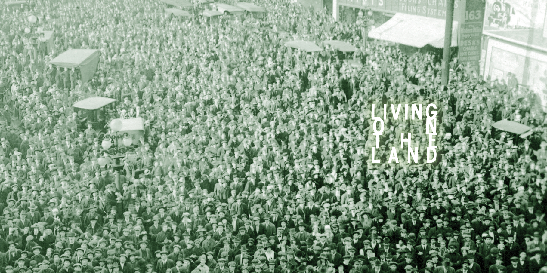 background image - old photo (early 1900's) of a large crowd looking up