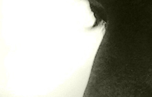 close-up black and white photo of Alex Thompson